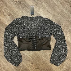 Polka dot top with hook and eye closure